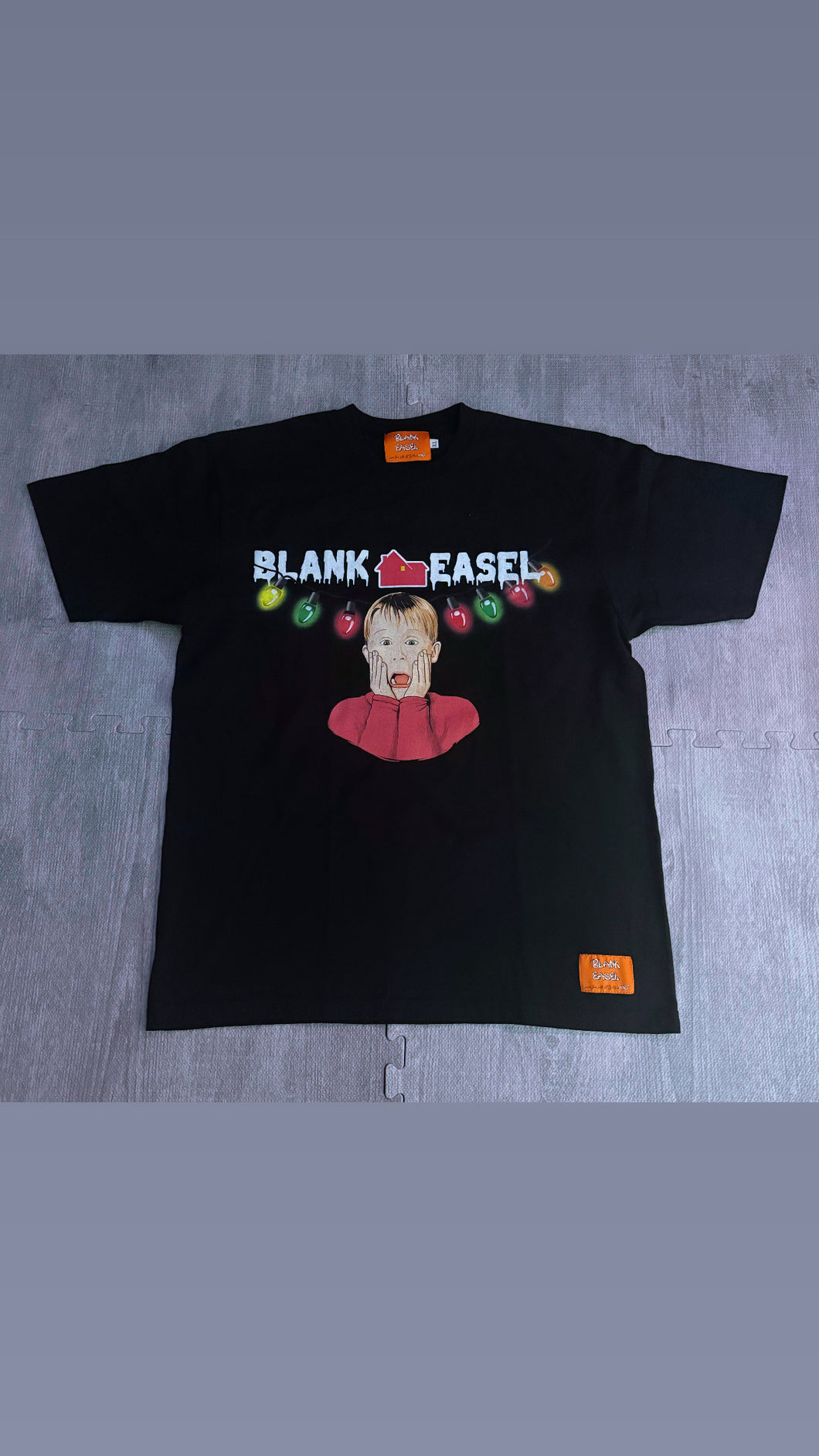 Black Blank Easel “Christmas at Kevin’s” Tee